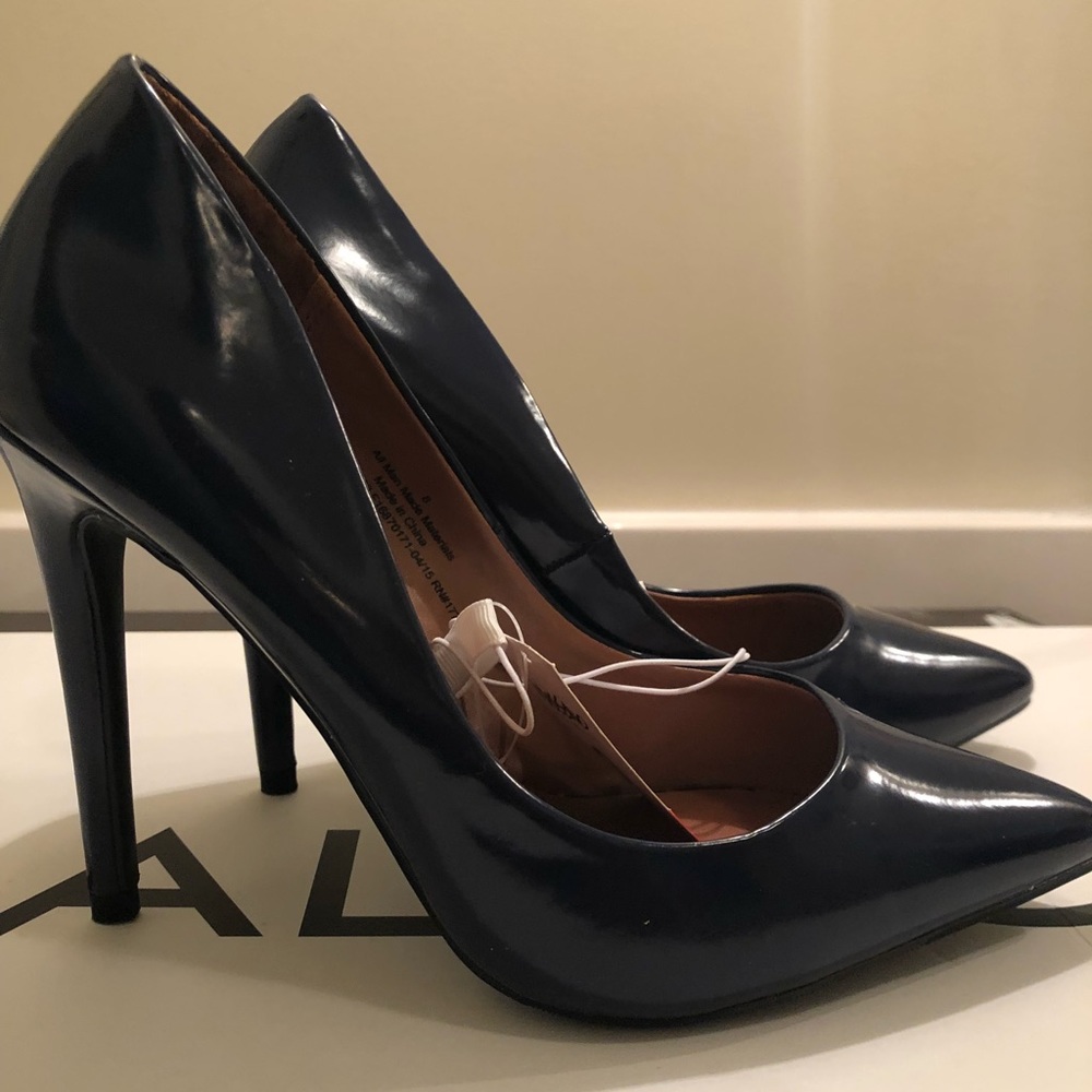 Navy blue leather pumps